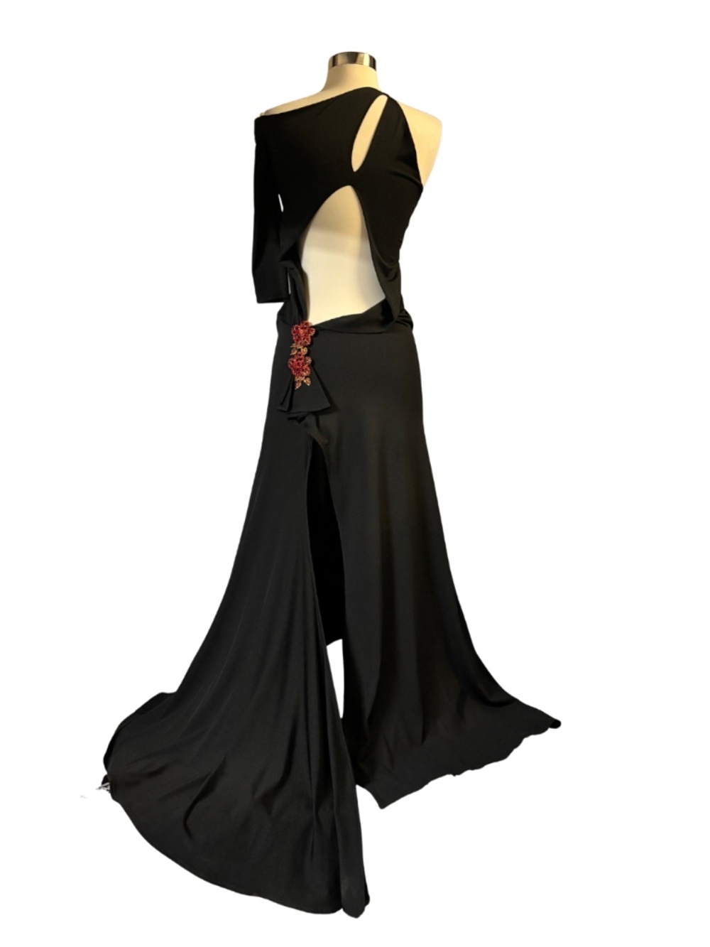Black Juan Carlos Pinera formal gown with cutouts and red floral embellishments